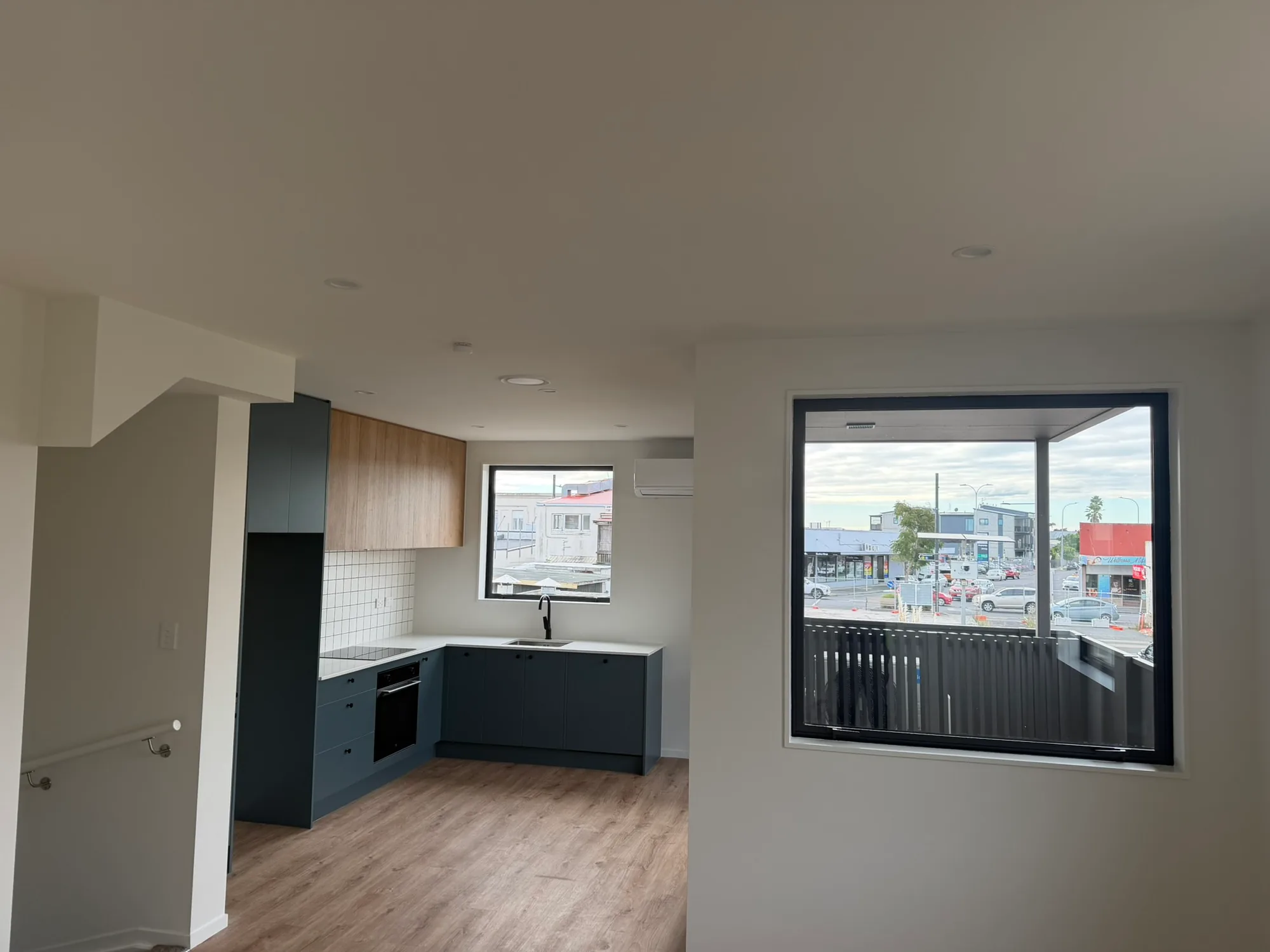 Modern kitchen renovation with open-plan living - Auckland builder Elevate Building and Design